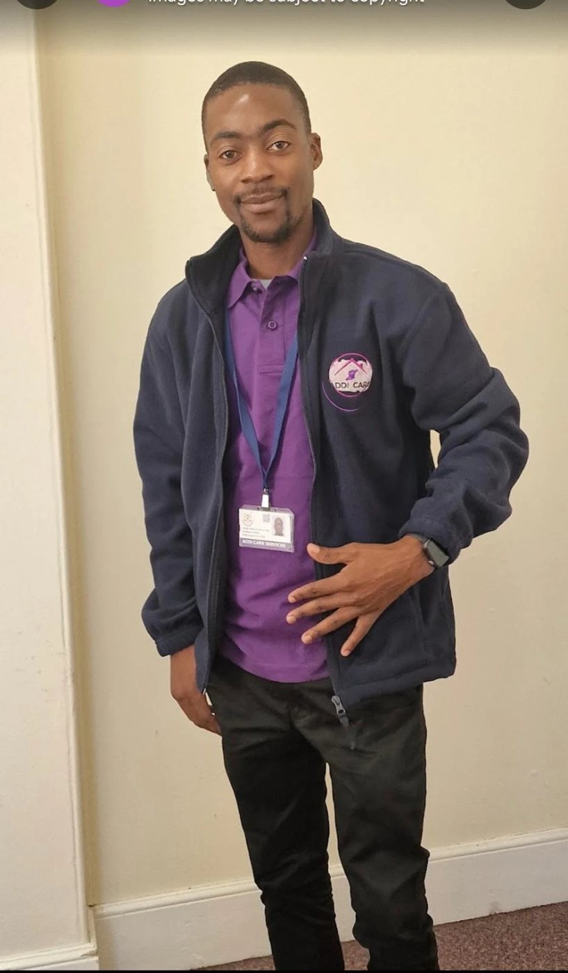 AddiCare team member in the purple AddiCare uniform and fleece