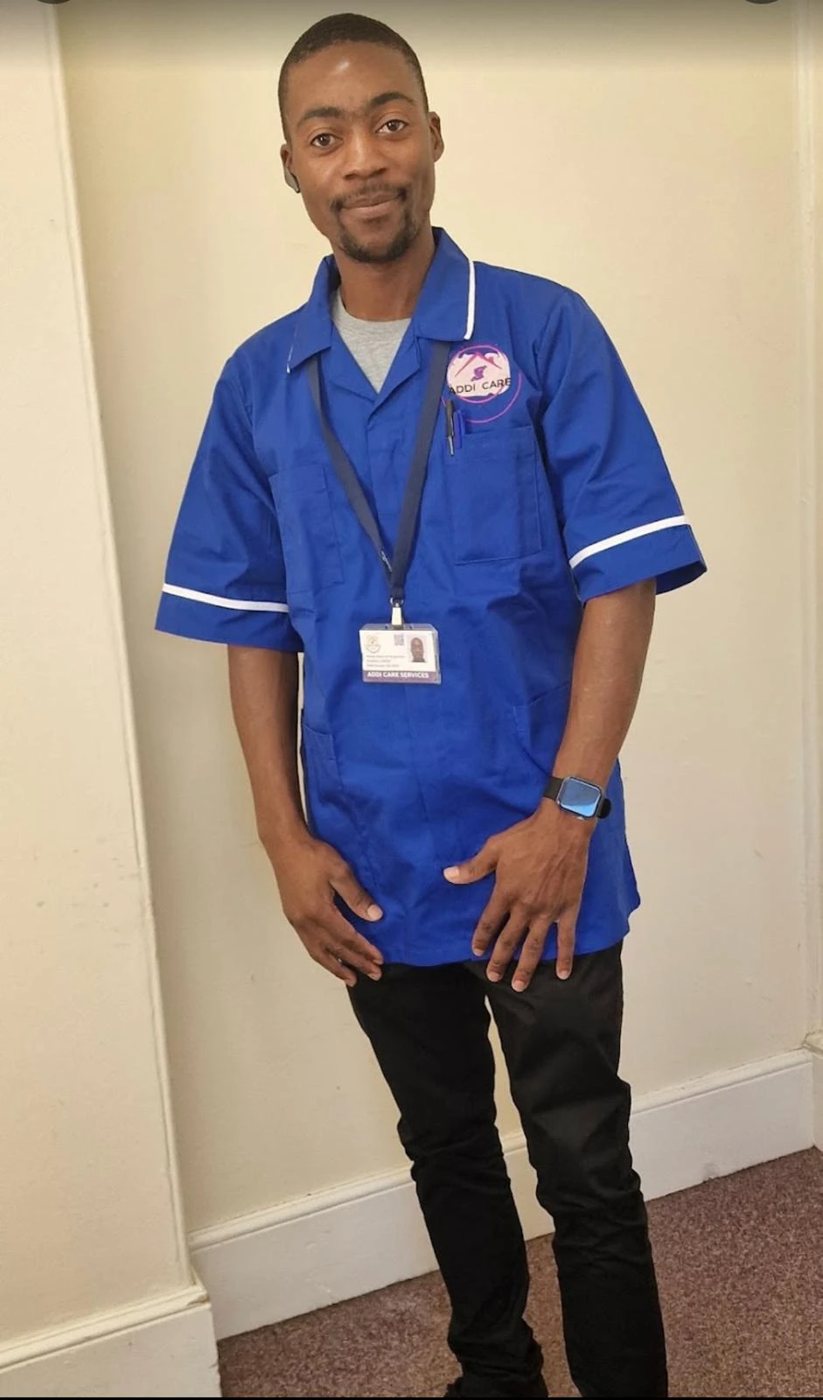 AddiCare care worker in the blue AddiCare tunic uniform
